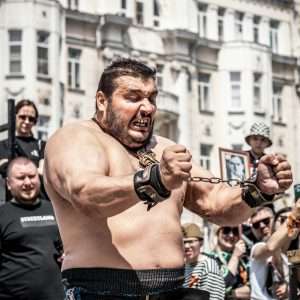 a man breaking a chain