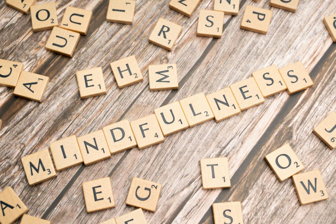 the word mindfulness spelled out with scrabble tiles